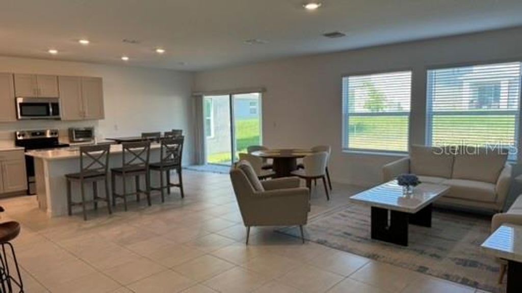 Photo of 4520 Ranunculus Street, Haines City, FL 33844 (MLS # S5150201)