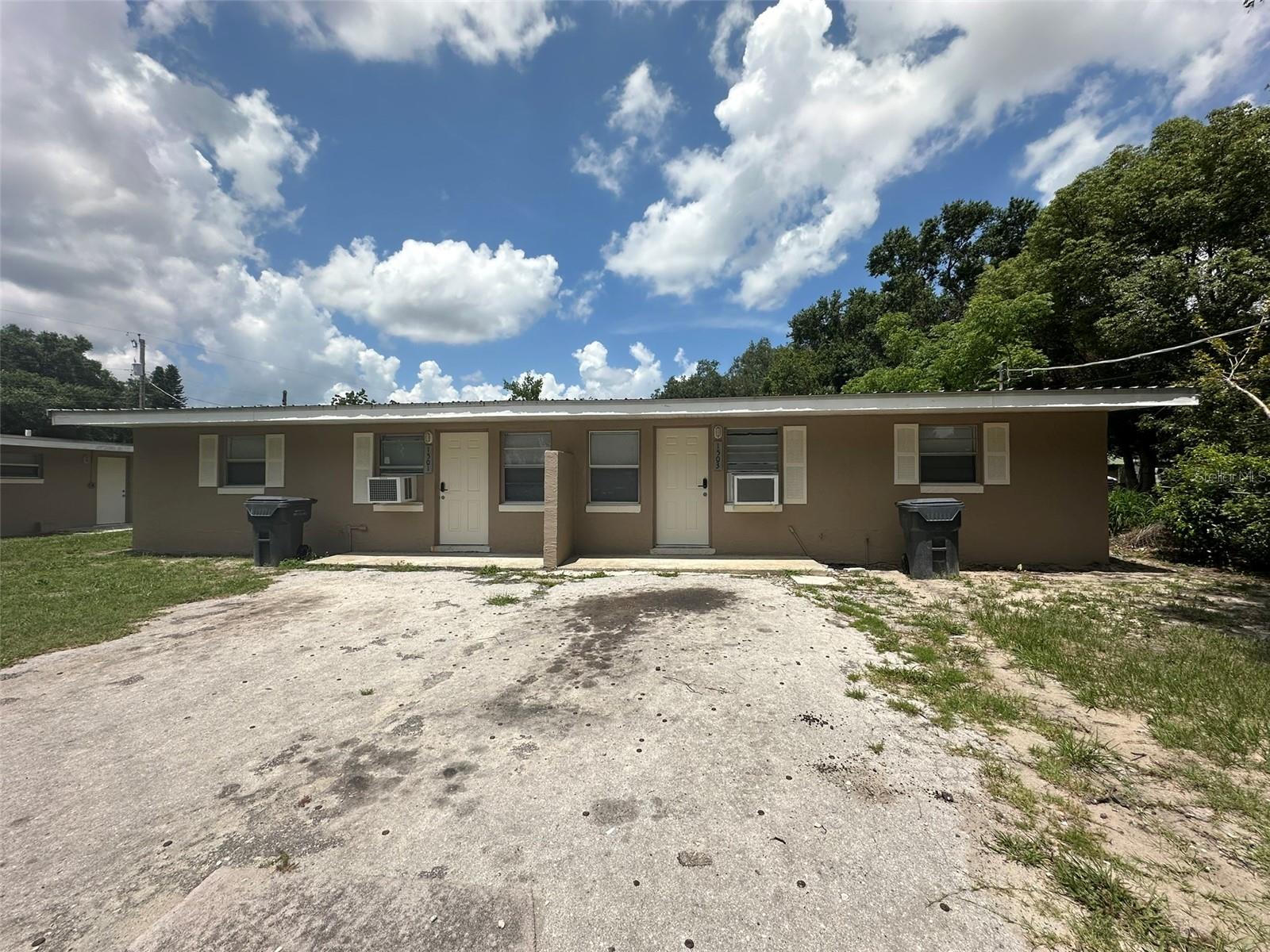 This two-bedroom, one-bathroom apartment is part of a duplex, with both units available for rent (Units 1501 & 1503). The home features tile flooring throughout, making it easy to maintain and perfect for Florida living. While there's no central AC, the apartment comes equipped with brand-new window units and ceiling fans in every room to keep things cool. Recently remodeled and located in a convenient area, this space offers comfortable living with easy access to local amenities. If you're looking for a practical and welcoming place to call home, contact us today for more details or to schedule a tour.