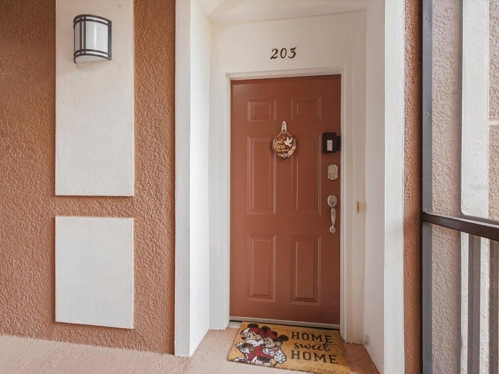 Photo of 8300 Portofino Drive #203, Davenport, FL 33896 (MLS # O6443652)