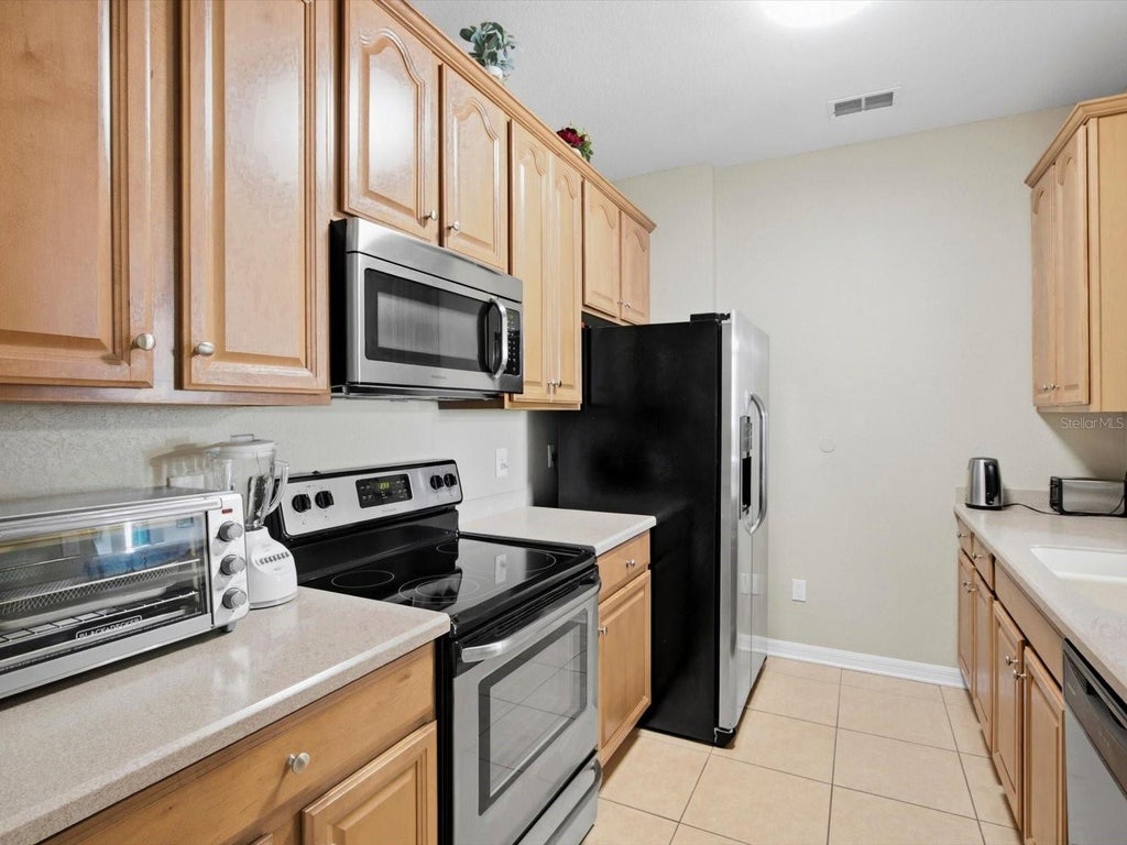 Photo of 8300 Portofino Drive #203, Davenport, FL 33896 (MLS # O6443652)