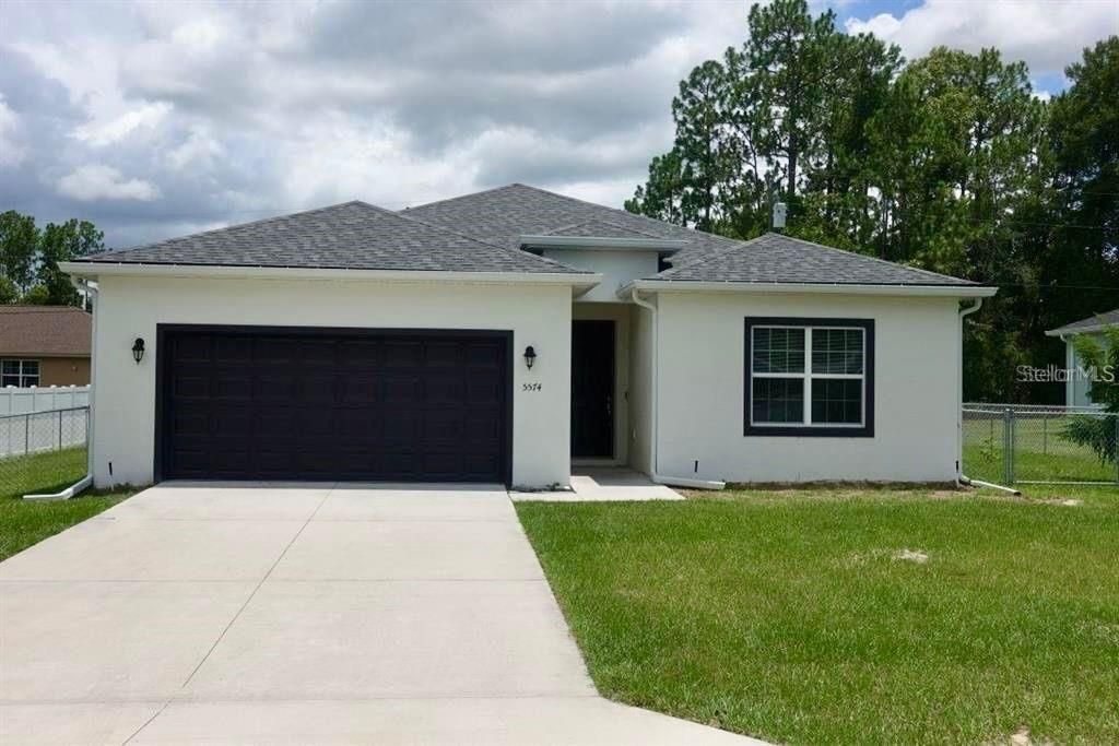 Photo of 5574 SW 128th Place, Ocala, FL 34473 (MLS # TB8512744)
