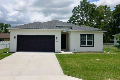 Photo of 5574 SW 128th Place, Ocala, FL 34473 (MLS # TB8512744)