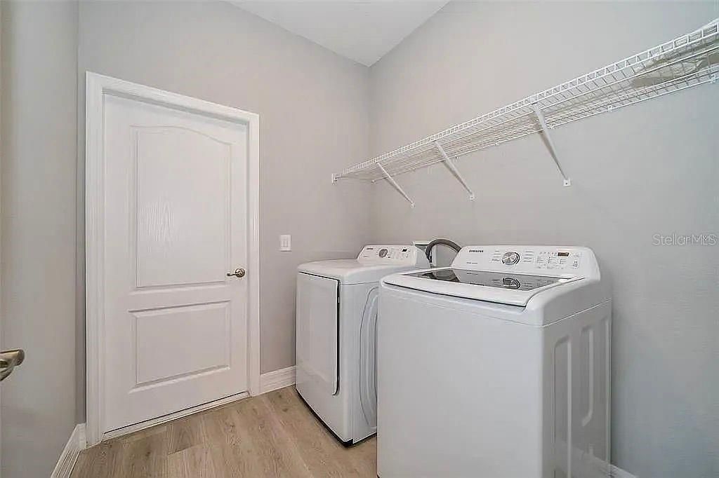 Photo of 5574 SW 128th Place, Ocala, FL 34473 (MLS # TB8512744)