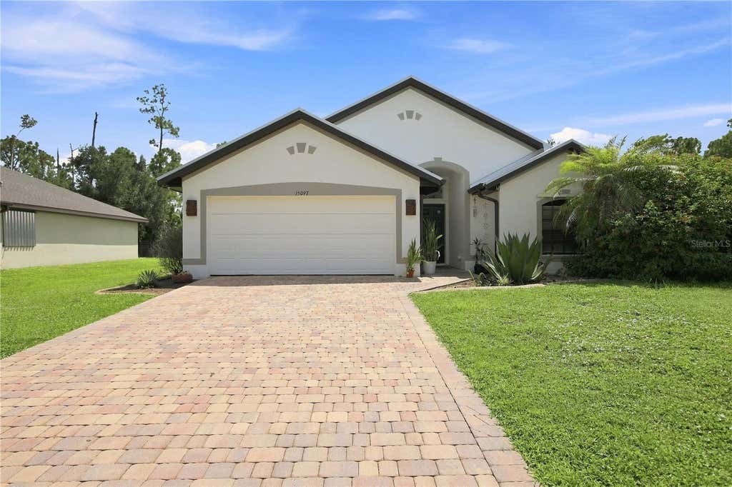 Photo of 15097 Malcolm Avenue, Port Charlotte, FL 33953 (MLS # A4703267)