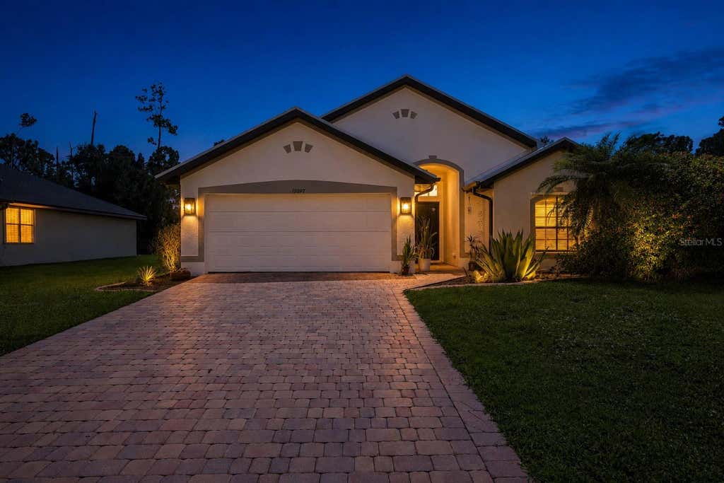 Photo of 15097 Malcolm Avenue, Port Charlotte, FL 33953 (MLS # A4703267)