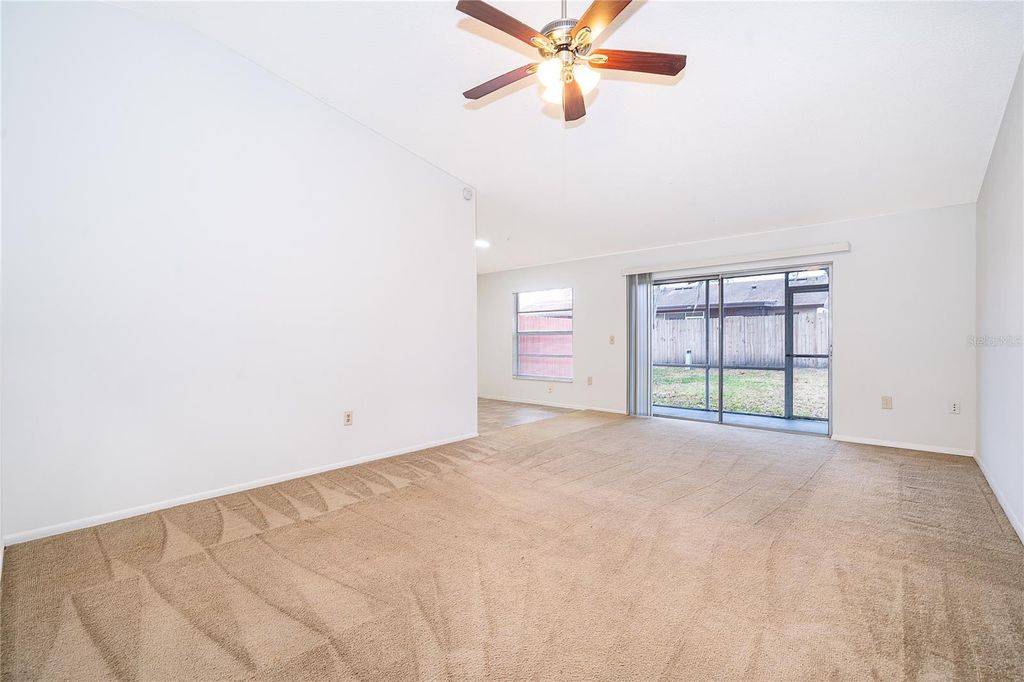 Photo of 7876 Guardsmen Street, Orlando, FL 32822 (MLS # O6382094)