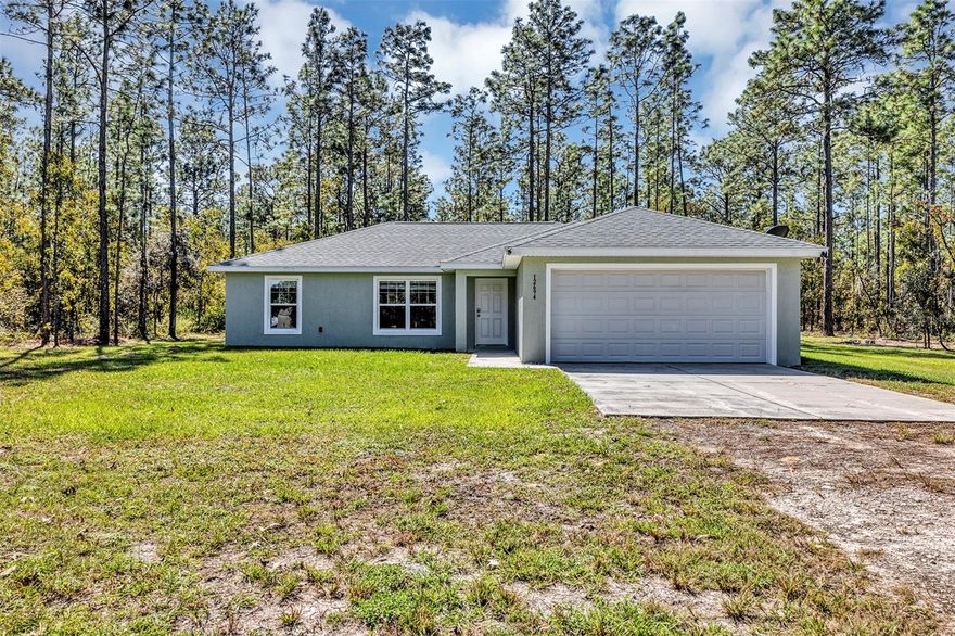 Enjoy easy living in beautiful Ocala!  This well maintained 3 bedroom 2 bathroom home offers a spacious open floorplan, perfect for both entertaining and relaxing.  From the moment you walk in, you'll appreciate the modern kitchen and well designed layout.  

Situated on a generous lot (over an acre!), there's plenty of space for outdoor activities, gardening, or just enjoying nature.  Whether you are hosting a family gathering or enjoying a quiet cup of coffee outside, this property provides the privacy and flexibility you are looking for.

Located in a peaceful area with easy access to local amenities such as the Rainbow Springs State Park, this home blends comfort and convenience.  Don't miss the chance to make it yours today!