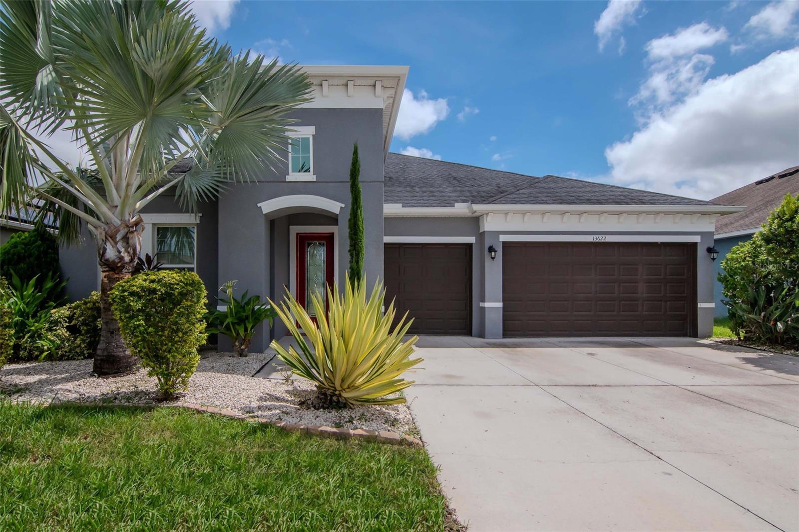 Any and all buyers, take advantage of this assumable loan at 2.37%. Discover the perfect blend of elegance, comfort, and Florida charm in this stunning custom-built home, ideally situated on a peaceful lakefront lot in the heart of Riverview. With no rear neighbors, a fully fenced backyard, and tranquil water views, this property offers a private outdoor oasis that’s ideal for both relaxation and entertaining. Step inside to a bright and open layout featuring soaring ceilings, abundant natural light, and thoughtfully designed living spaces. The formal dining room and multiple flexible areas provide plenty of room for working from home, hosting guests, or simply spreading out in style. The gourmet kitchen is a chef’s dream—complete with granite countertops, ample cabinetry, a walk-in pantry, and seamless flow into the main living area—perfect for everyday living and entertaining alike. The oversized primary suite is your personal retreat, featuring serene water views, 2 walk-in closets, a linen closet, and a spa-inspired bathroom with a soaking tub and a separate walk-in shower. Additional bedrooms offer generous space and comfort for family and guests. Step outside to enjoy your private backyard sanctuary, prewired for a pool and equipped with an integrated speaker sound system throughout the home. Imagine evenings spent gardening, grilling, or relaxing as the sun sets over the lake. The yard also features mature fruit trees—Guava, Banana, Mango, and Avocado—adding a touch of tropical living.