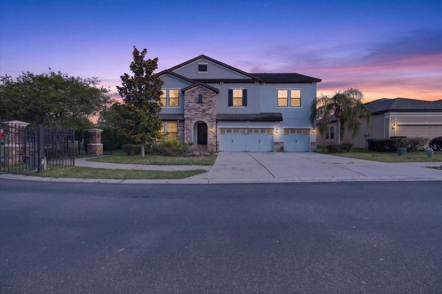 Welcome to luxury living in the gated community of Heritage Landings! This beautifully upgraded 4-bedroom, 3.5-bathroom residence offers over 3,400 square feet of thoughtfully designed living space with modern designer finishes throughout and is located in a NON-flood zone area. From the moment you arrive, you’ll notice the freshly painted interior, impressive curb appeal, and spacious 3-car garage. Inside, the home has been extensively updated with brand-new top-of-the-line kitchen appliances, upgraded cabinetry with modern paint and finishes, a stunning waterfall kitchen island, new granite countertops and vanity tops, luxury PVC accent wall décor that perfectly complements the living room design, modern light fixtures, updated vanities, and elegant designer touches throughout the living areas.

The open-concept layout is perfect for entertaining and everyday living, featuring expansive living areas, abundant natural light, and seamless flow between the kitchen, dining, and family spaces. The spacious primary suite offers a true retreat with a spa-inspired bathroom featuring oversized dual walk-in closets, new countertops, upgraded finishes, fresh paint, a large luxury LED anti-fog mirror, modern light fixtures, and additional updates throughout the secondary rooms. All bathrooms have been upgraded with new luxury tile work, modern vanities, updated countertops, and stylish finishes, along with several additional upgrades throughout the home.
Situated on a premium homesite with peaceful water views, this move-in-ready home combines luxury, space, and convenience in one of Lakeland’s most desirable gated communities. Conveniently located near shopping, dining, medical facilities, major highways, and everything Lakeland has to offer. This is not your typical resale — this home shows like a model and is truly turnkey.
