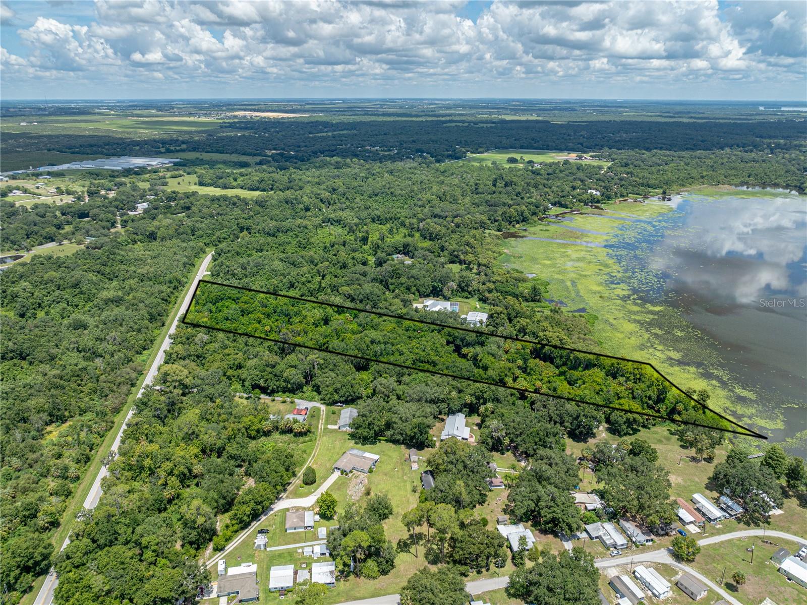 THIS IS BEAUTIFUL LAKEFRONT ACREAGE WITH MAJESTIC TREES located on Lake Pierce in Lake Wales, Florida. The property is 6.32 acres. The lot has 415 feet of lakefront and is just waiting for a new owner to build their dream home. The depth of the property (1044 feet) will provide lots of privacy and plenty of space for your residence, pool, storage, etc. This amount of lakefront acreage is at a premium in Central Florida. Lake Pierce is a 3,800+ acre lake known for great fishing. The property is located close to Legoland, Disney and both East and West coast beaches.