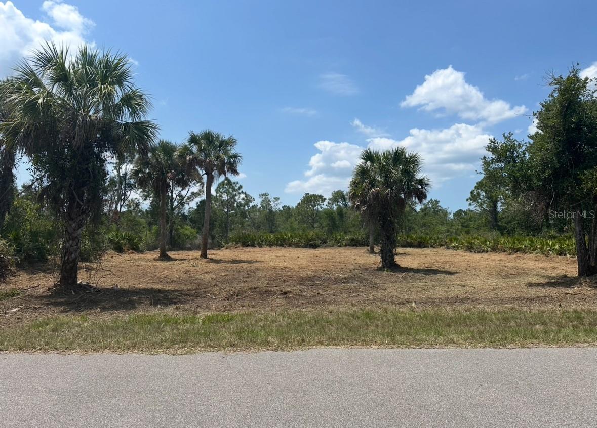 This lot in the heart of Port Charlotte is cleared, surveyed and ready for your vision. Situated on a quiet paved street with no HOA or deed restrictions, you’ll enjoy the freedom to build your dream home or as a long-term piece of investment. Property not in a scrub jay zone and does has no utility assessments pending. Minutes from the Myakka River, Gulf beaches, shopping, dining, and I-75 for easy access to everything Southwest Florida has to offer