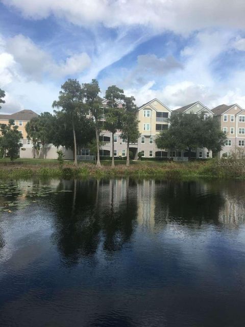 Photo of 3384 Corona Village Way #206, Orlando, FL 32835 (MLS # TB8449236)