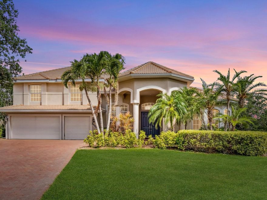 Lovely spacious home on quiet premium oversized cul-de-sac parcel with 180-DEGREE WATER VIEW AND NOT IN A FLOOD ZONE!  Enjoy sunsets from your lanai every night and the peace of mind knowing there is a BRAND NEW 2025 TILE ROOF overhead... Freshly painted interior; Immaculately maintained; New Luxury Vinyl Wood Flooring in all 1st floor public areas; FIRST FLOOR PRIMARY ENSUITE BEDROOM AND SITTING AREA with a lovingly upgraded DUAL VANITY bathroom; Natural gas; Upgraded 18 +/- month old  Kitchen Appliances;  Two 2019 Air Conditioners; 18 foot Ceilings in Family room and Kitchen; Split, Open Floorplan; 12 foot Ceilings in Primary Ensuite; Access to lanai, saltwater pool and water view from multiple first floor locations; Flexible floor plan ... On the First Floor: Primary Ensuite Bedroom  and either 5th bedroom with full bath OR Office/Den plus Pool Bath; Upstairs 3 Bedrooms and 2 Baths (1 Ensuite); In Excellent School District and near multiple private schools; Freshly Resealed Paver Driveway, Front Walkway and Pool Deck; 3 Car Garage Salt Water, Heated Swimming Pool with 180 degree water views and generous lanai area for luxuriating outdoors; Hurricane Sutters for all openings; Irrigation System with Reclaimed Water; Wonderful MOVE-IN-READY in super convenient location ...LOW HOA FEES ... NO CDD ... Lovely Community Amenities which include:  Clubhouse, Fitness Center, Pickleball Courts and Community Pool. Easy to show ... GATE CODE REQUIRED FOR SHOWINGS;  Seller downsizing and moving to another Florida city.  A GREAT BUY for some lucky person.