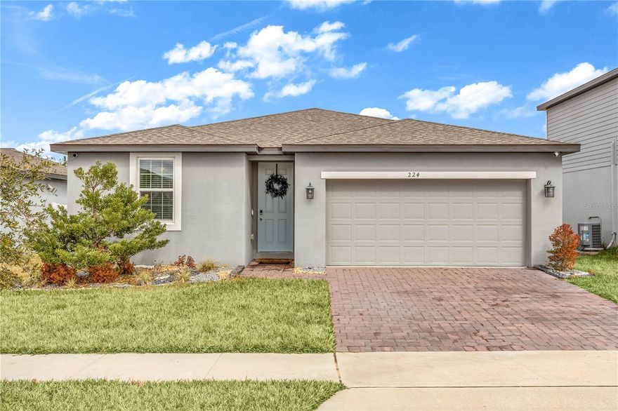 Welcome to 224 Towns Circle, Haines City, FL 33844. Built in 2022 by Meritage Homes, this newer construction single family home offers 1,491 sqft, 3 bedrooms, 2 full baths, and thoughtful upgrades designed for comfortable everyday living. The open concept layout connects the kitchen, dining, and living areas, creating an easy flow for gatherings and daily routines.

The kitchen features white cabinetry paired with Bengal White granite countertops, stainless steel appliances, and generous prep space. Tile flooring runs throughout the home with all carpet removed, offering durability and easy maintenance. Ceiling fans are installed in every room for added comfort.

Additional upgrades include a generator and a water filtration system, adding convenience and long term value. Pride of ownership is evident throughout, with the home meticulously maintained inside and out.

Situated on approximately .14 acres, the fully fenced backyard with no rear neighbors provides privacy and usable outdoor space for play, pets, or entertaining. The 2 car garage adds storage and everyday functionality.

If you are searching for a 3-bed home in Haines City with low HOA, modern finishes, meaningful upgrades, and a private fenced yard, this move in ready property delivers comfort, efficiency, and lasting value.