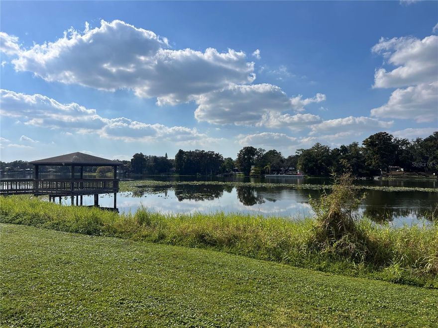 Fully FURNISHED and beautifully remodeled, this studio condo sits directly on the Hillsborough River, offering amazing WATER VIEWS right from your bedroom. Located on the first floor for effortless access, this home blends modern luxury with serene riverfront living—and comes completely turn-key with stylish FURNITURE, a flat-screen TV, and a fully equipped kitchen. The gated community provides exceptional amenities including water access, a resident boat ramp, fishing areas, a park and playground, a fitness center, racquetball, a pool and spa, a clubhouse, and 24/7 guard security. HOA services cover pool maintenance, exterior upkeep, trash, water, and security for truly worry-free living. The unit features wide-plank wood flooring throughout and a NEW IN-UNIT WASHER AND DRYER. For water enthusiasts, optional boat and trailer storage is available for a monthly fee, and a peaceful riverside gazebo offers a perfect spot to fish, relax, or enjoy the view. Ideally located just minutes from USF, Busch Gardens, Tampa International Airport, and top shopping, dining, and entertainment, this stunning studio is available now.