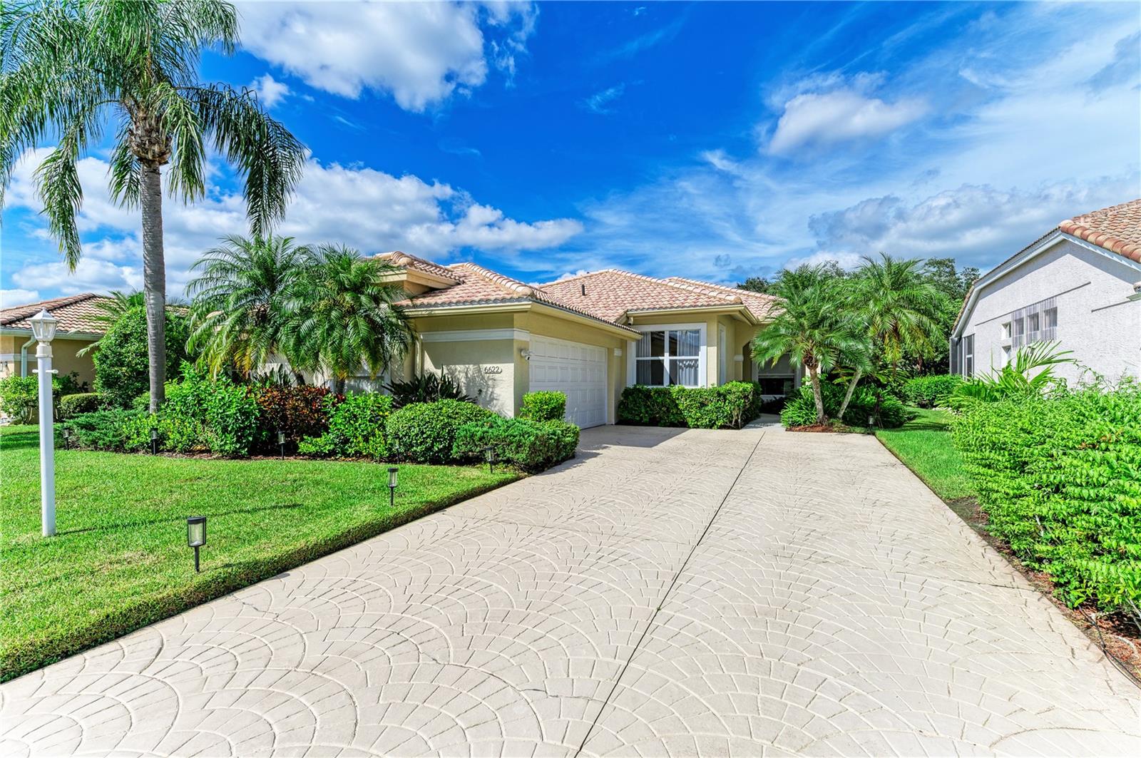 Welcome to your dream home in the prestigious River Club community of Lakewood Ranch! This beautifully updated one-story residence offers 3 spacious bedrooms, 2 modern bathrooms, a 2-car garage, and breathtaking views of the golf course and preserve. With a perfect blend of style, comfort, and location, this property is a rare gem—priced to move quickly.
Interior Highlights
• Bright & Airy Layout with abundant natural light and upgraded luxury vinyl plank flooring throughout
• Remodeled Chef’s Kitchen featuring white cabinetry, granite countertops, stainless steel appliances, and seamless flow into the great room—perfect for entertaining
• Primary Suite Retreat with lanai access, serene golf course views, large walk-in closet, and dual vanities
• Stylishly Updated Bathrooms with contemporary fixtures and finishes
• Functional Laundry Room with cabinetry, workspace, and oversized sink
Outdoor Living
Step into your private screened lanai and enjoy tranquil mornings or relaxing evenings overlooking lush greenery and fairway views. The expansive backyard offers ample space to extend the lanai or add a custom pool—design your own outdoor oasis!
Recent Upgrades
• Brand New AC (2025)
• Remodeled Kitchen & Bathrooms
• Newer Roof
• Fresh Interior Paint
• Plantation Shutters & Upgraded Lighting Throughout
Prime Location & Lifestyle
River Club is one of Lakewood Ranch’s most desirable communities—offering peace, privacy, and unbeatable convenience. With low HOA fees, no CDD, and no mandatory golf membership, it’s one of the most affordable golf course neighborhoods in the region.
Enjoy proximity to:
• Waterside Place & Lakewood Ranch Main Street
• UTC Mall & Heritage Harbour
• Top-rated schools & medical facilities
• Easy access to I-75, SRQ/TPA airports, Sarasota, Bradenton, St. Pete, Clearwater & world-class Gulf Coast beaches
Room to Add a Pool
Fees Low HOA, No CDD, No Golf Membership Required
Updates New AC (2025), Kitchen & Bath Remodel, Newer Roof
This is your chance to own a move-in-ready home in a premier golf course community—without the premium price tag. Schedule your private showing today before this opportunity disappears!