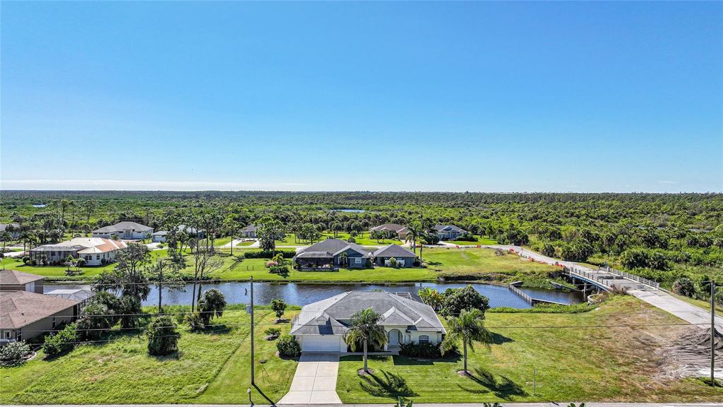 Photo of 1185 Rotonda Circle, Rotonda West, FL 33947 (MLS # D6144436)