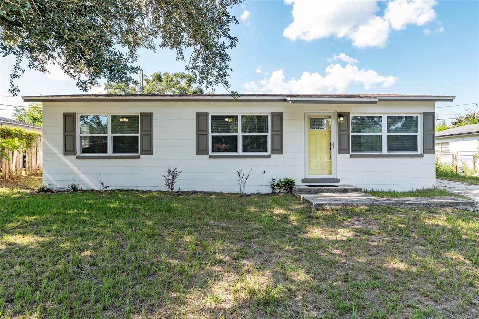 This fully updated 3-bedroom, 1-bath concrete block home combines clean design, energy efficiency, and smart upgrades. Located minutes from downtown Gainesville, it features a fresh, open layout with luxury vinyl plank flooring throughout. The kitchen includes granite countertops, stainless steel appliances, recessed lighting, and elevated cabinetry. The bathroom is tiled floor to ceiling with a large window that fills the space with natural light. Additional highlights include an updated roof, HVAC, water heater, and windows. Laundry is located just off the rear entry. The oversized yard offers plenty of space for entertaining, gardening, or future customization. No HOA Fees. FHA, VA, and Conventional financing accepted. The updates are done. The systems are strong. The opportunity is yours. Private tours available by appointment.