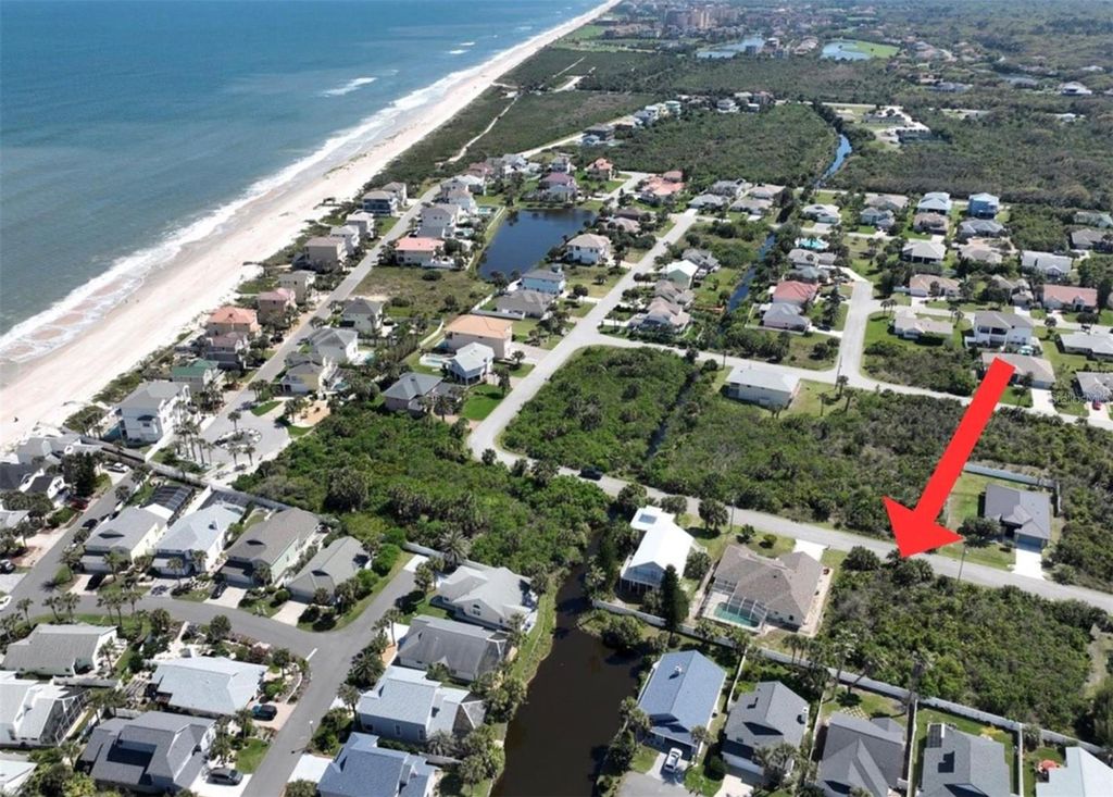 Photo of 11 Mahoe Drive N, Palm Coast, FL 32137 (MLS # FC315786)