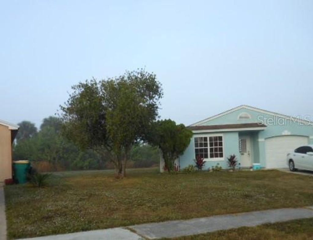 Photo of 505 Ricold Terrace, Port Charlotte, FL 33954 (MLS # C7518991)