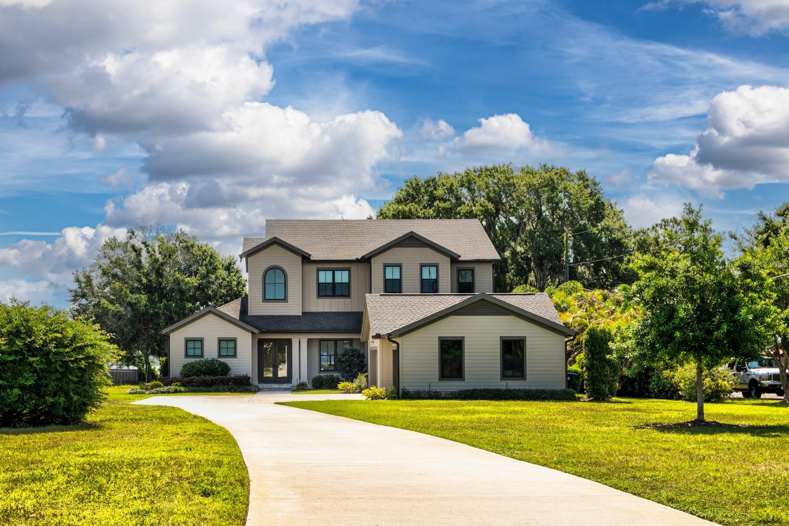 Presenting 9019 Lake Mabel Dr, a stunning custom-built single-family residence designed for luxurious lakefront living. Priced at $2,300,000, this impeccable home boasts five bedrooms, five and a half baths, offering unparalleled privacy and serene lake views. Built in 2017, every inch of this property reflects a dedication to quality and sophistication, with upgrades galore that elevate the living experience.
Step into a dream kitchen where culinary creativity knows no bounds. Featuring top-of-the-line appliances, upgraded cabinets, a spacious island, and breathtaking views of Lake Mabel, it's a space where cooking and entertainment merge seamlessly. The house's interior harmonizes luxury and comfort, with porcelain tiles and engineered wood floors laying the foundation for a refined aesthetic.
High ceilings and a bonus room add to the home's expansive feel, while a summer kitchen and dedicated storage for lake toys ensure outdoor living is as gratifying as the indoor. The property includes a private dock, inviting endless water activities right from your backyard.
Lake Mabel Drive is a haven of tranquility, with no through traffic to disturb the peace. This exclusive community comprises 36 lakefront homes, with no public access to Lake Mabel, ensuring privacy and exclusivity. The rear yard extends over 200 feet to the water's edge, promising serene lake views and direct access to water-based leisure.
Lake Mabel itself is a private, 394-acre gem nestled in Unincorporated Orange County, offering residents a unique waterfront lifestyle away from the public eye. This residence is not just a home; it's a retreat for those who seek luxury, privacy, and a connection with nature. Schedule your showing today before it's too late.