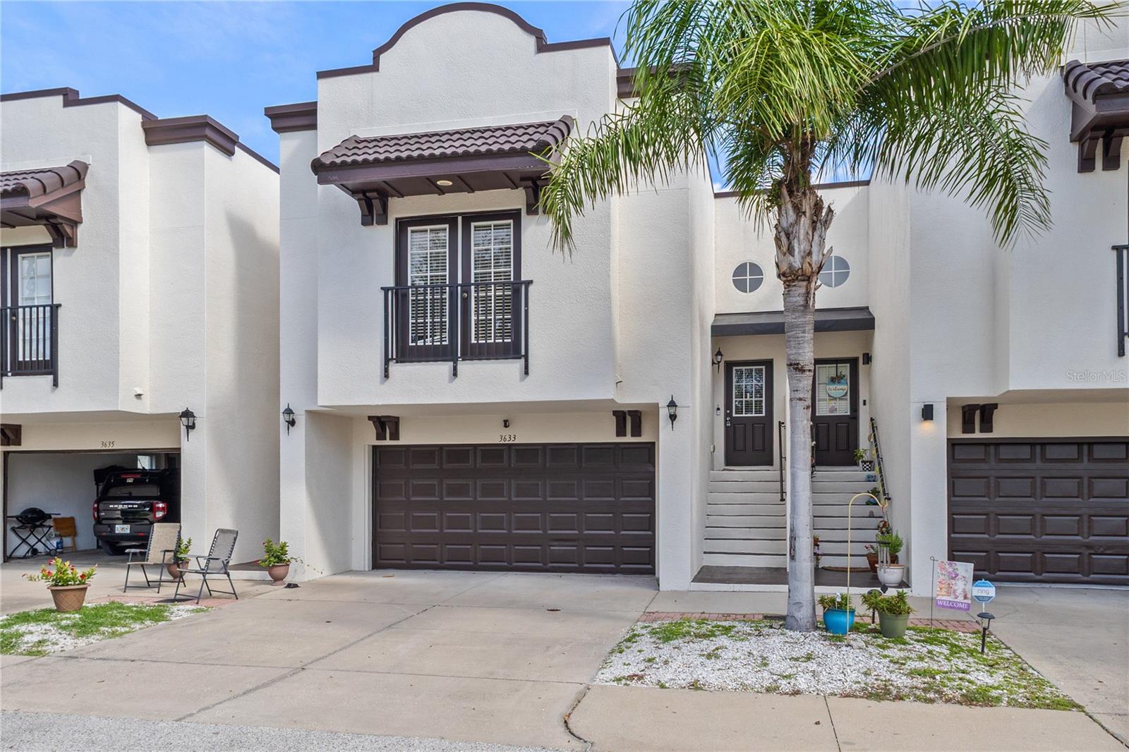 Located in the heart of South Tampa, just minutes from MacDill Air Force Base, this spacious 3-bedroom, 2.5-bath, 2-story townhome offers comfort, flexibility, and modern upgrades in an unbeatable location. Positioned close to the community pool with convenient guest parking, this residence welcomes you with versatile entry options—either through the ground-level 2-car garage or via a soaring second-story foyer.
Upstairs, an open yet defined floor plan provides the perfect setting for family gatherings and entertaining. The updated kitchen features granite countertops, a breakfast bar, stainless steel appliances, ample pantry storage, and direct access to the dining area. Luxury vinyl flooring flows seamlessly throughout the main living spaces, including the generous living room, guest half-bath, and impressive primary suite.
The primary suite offers a true retreat with a walk-in closet, French doors leading to a Juliet balcony, and a spacious ensuite bath complete with dual vanities, a soaking tub, and a walk-in shower.
Downstairs, privacy is maximized for guests or family members with two generously sized bedrooms, a full bathroom with a tub/shower combo, and extra closet storage.
Highlights include:
Two-story layout with flexible living arrangements
Updated finishes and luxury vinyl flooring
Two-car garage + guest parking
Juliet balcony off the primary suite
Excellent community amenities and location
This move-in-ready home is vacant and easy to show—don’t miss your chance to own a beautifully upgraded townhome in one of Tampa’s most desirable neighborhoods. Schedule your showing today!