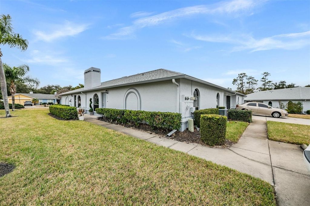 Photo of 23205 Club Villas Drive #30, Land O Lakes, FL 34639 (MLS # TB8472334)