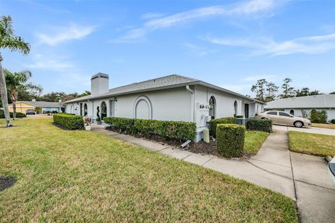 Photo of 23205 Club Villas Drive #30, Land O Lakes, FL 34639 (MLS # TB8472334)