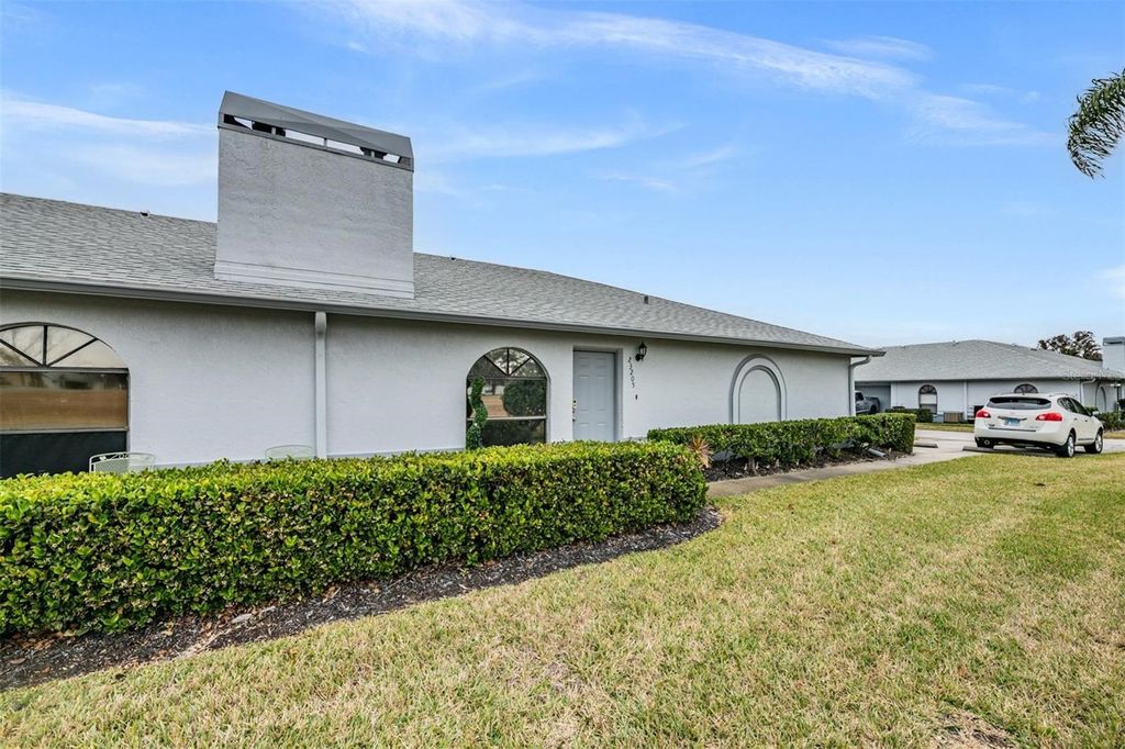 Photo of 23205 Club Villas Drive #30, Land O Lakes, FL 34639 (MLS # TB8472334)