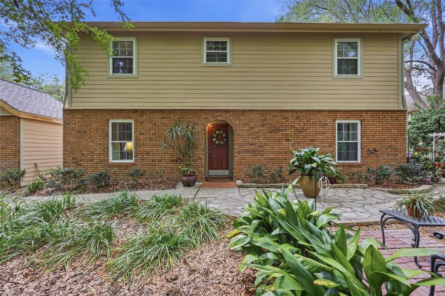 Welcome to one of the best end units in Plantation Villas, nestled in the heart of Haile Plantation. This is a single family attached townhome that offers the ease of low maintenance living, with the association responsible for exterior maintenance including the roof and siding, as well as landscape maintenance. Lovingly owned and gently used for over 30 years, this light filled home offers a rare combination of privacy, thoughtful updates, and timeless charm. Step inside to find an inviting living space where natural light pours in through expanded windows, made possible by the detached 1 car garage design, an end unit perk that truly sets this home apart. The main living areas feature warm wood flooring, soft neutral tones, and a seamless flow into the dining space, perfect for everyday living or entertaining. The updated kitchen showcases painted solid wood cabinetry with a factory quality finish, stylish backsplash, stainless appliances, and added functionality with custom rolling drawers for easy access and storage. Just beyond, the dining and living areas open to a peaceful outdoor setting. Upstairs, the staircase has been upgraded with solid oak treads and banister, adding both durability and elegance. All three bathrooms have been updated, and the home features new windows throughout and a new slider in 2021 for improved efficiency and aesthetics. Comfort is top of mind with a replaced HVAC system in 2023, enhanced airflow balancing, and dual thermostats for upstairs and downstairs control. Step outside to enjoy a beautifully designed patio space, pre wired for a fountain and ideal for relaxing or entertaining, surrounded by lush landscaping and the natural beauty Haile is known for. Located just moments from Haile Village Center, you will enjoy easy access to walking trails, restaurants, shops, and playgrounds, all part of the vibrant Haile Plantation lifestyle. This is a rare opportunity to own a bright, updated end unit in one of Gainesville’s most sought after communities.