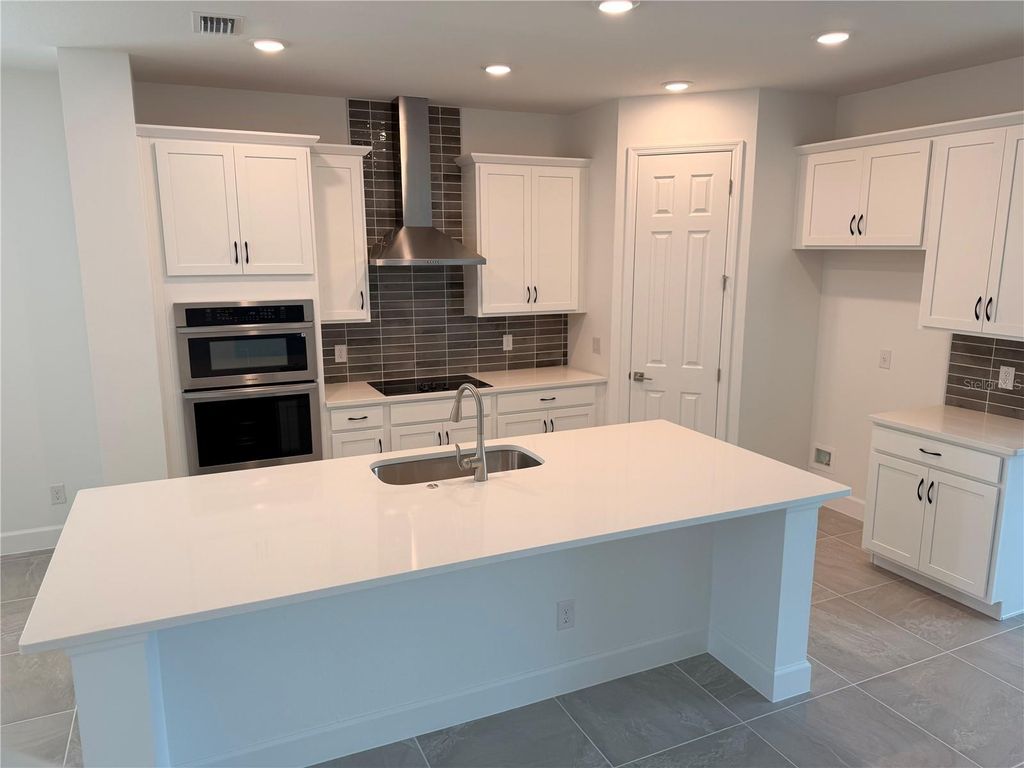 Photo of 2614 Cavanaugh Drive, Orlando, FL 32817 (MLS # O6408051)