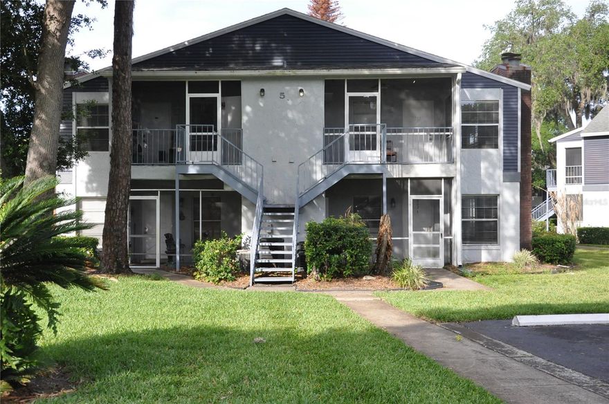 Start your day off with Peace and Tranquility. Check out this Fabulous 2nd Floor Condo in Northlake Village with views of Lake Minnie in the heart of Sanford. Nestled in the middle of the complex, Building 5 is one of the most convenient buildings as it is near the pool, tennis court and mailboxes. When you walk through the front door of this marvelous Condo, you immediately feel positive energy from the trees and nearby lake. Open and spacious layout, it has a split 2\2 bedroom plan with each bedroom having its own bathroom space.   Although HSF seems small, this Condo has a layout designed to use all of the space provided, as most Builders did in the mid-80s. Views of nature, trees and Lake Minnie that you see daily from your front window are simply priceless.  The Wood Burning Fireplace in the Family Room near the back porch and Primary Bedroom creates a cozy ambiance with the glorious lake and tree combination for the entire place. Amazing amenities such as a clubhouse with fitness center, pool, racquetball & tennis courts are another big plus in Northlake Village. Top-notch Seminole County Schools. Zoned for Lake Mary High School. Perfect location that is close to Sanford Airport, Sun Rail Station, 17-92, 417, 46, and 1-4. Not to mention a plethora of restaurants and shopping everywhere. PLUS+ this location is also just a hop, skip, and jump to Beaches on both coasts and Theme Parks using major roadways near the community. Do yourself a favor and check out this Charming CONDO in person to imagine yourself living here and feel the positive vibes with nature.