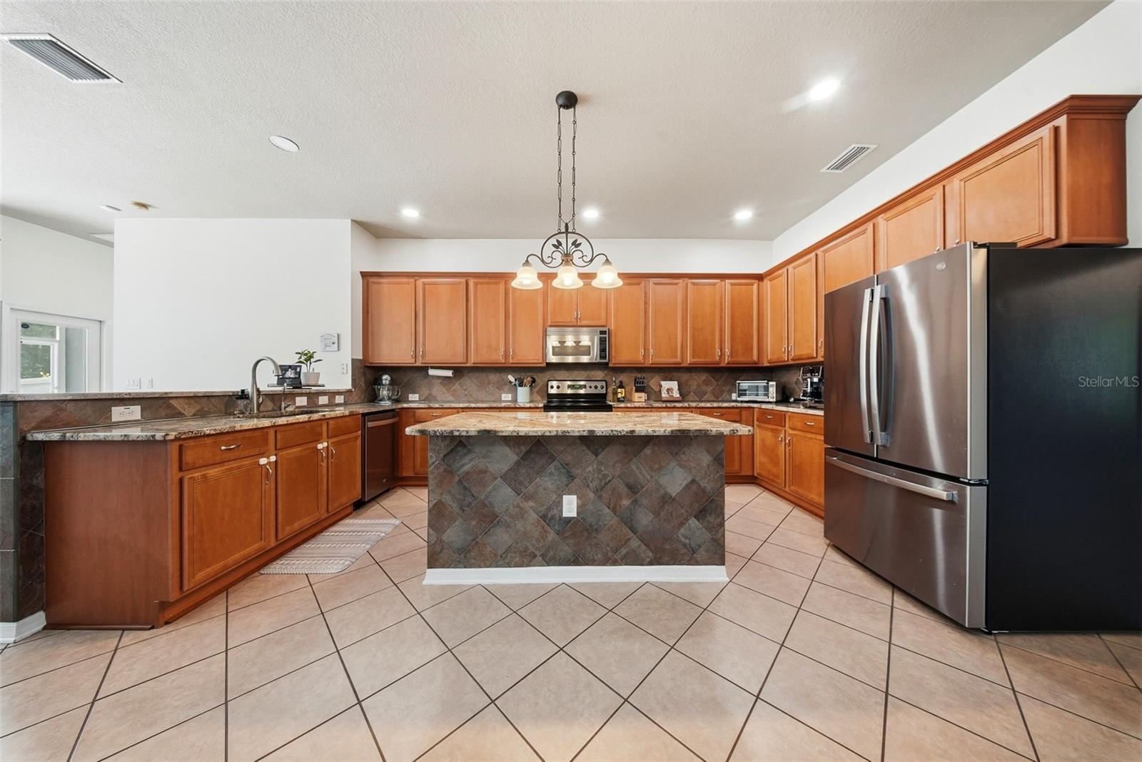 7544 WHISPERING WIND DRIVE