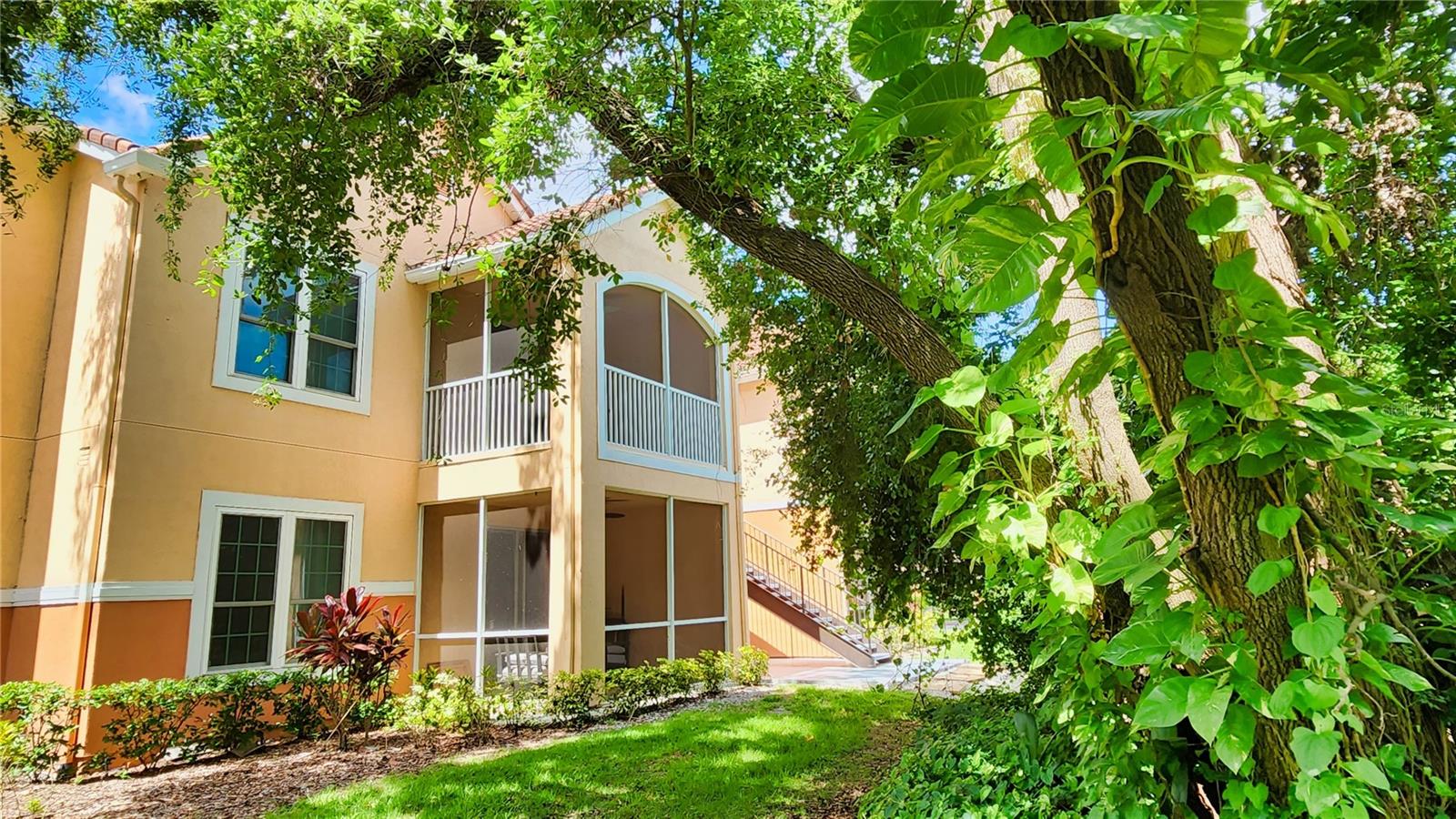 GREAT COASTAL LOCATION & CLOSE TO THE TOP-RATED U.S. BEACH ON SIESTA KEY! This spacious 2-bedroom, 2 bath condominium home is an end unit on the 2nd floor (top floor in the building) with a wooded view and vaulted ceilings offering spaciousness and privacy. It is conveniently located close to the clubhouse, pool, fitness center and mailboxes. It boasts beautiful wood laminate flooring, custom paint, shiplap in the living room, upgraded light fixtures and ceiling fans, new plumbing fixtures and door hardware throughout. It features an open floor plan with a living area that has a screened lanai with a beautiful nature view, a raised breakfast bar that is shared with the kitchen and a dining area to the side of the kitchen. The kitchen features solid surface countertops, glass tile backsplash, custom cabinetry, stainless appliances and contains a side-entry laundry closet with a full-size washer and dryer. The private, master bedroom has 2 large windows, a walk-in closet and "en suite" bathroom. The shower is tiled and glass enclosed with a beautiful vanity and lighted mirror. The second bedroom has 2 large windows and is located across the hall from the main bathroom which includes a large tub with shower. The unit comes with an assigned, lighted carport. The building’s exterior has been renovated with impact resistant thermal windows. The floor plan is in the photo gallery.
The condo is in the quiet, gated community named “Bella Villino Condominiums” which is located in the award-winning, master-planned development of “Palmer Ranch” in south Sarasota. The community boasts superb amenities not available at comparable properties in this price range and features an elegant clubhouse with a resort-style heated pool and spa, a large fitness center with state-of-the-art equipment including cardio machines, indoor racquetball and basketball, a billiards room, and a business center. The community has a tennis court, pickle-ball courts, a car detail area, gas grills with picnic areas, pet stations located around the property, an onsite property manager, and maintenance staff. It is close to world-class beaches, marinas, the popular Legacy Trail (bicycle, jog, or walk), shopping centers with a Costco, Target, Publix, Walgreens, CVS, various banks, restaurants, golf courses, art centers, museums, and so much more. Unfurnished 12 month lease.