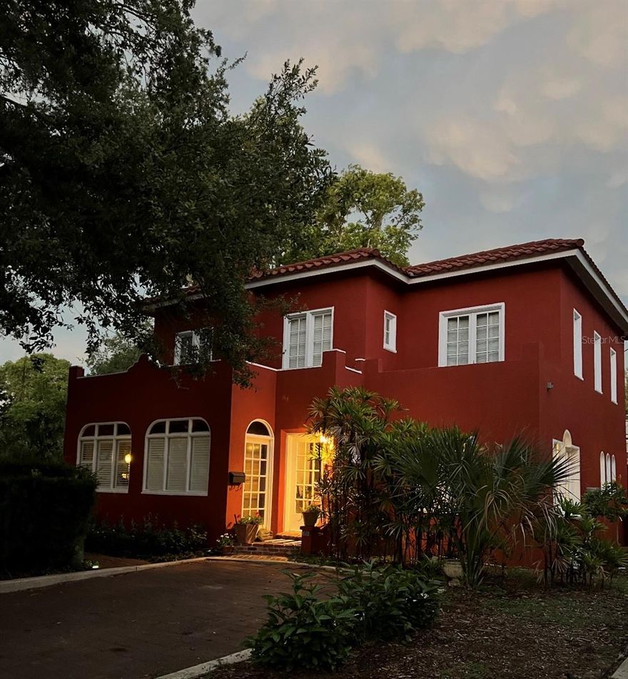 Elegant 1922 Mission Revival home, located in popular College Quarter is a registered historic place in Winter Park, FL. Lifestyle is neighborly/relaxed/pet friendly/enhanced by proximity to Lake Virginia/lakeshore sidewalks/Rollins College campus/downtown Winter Park/Central Park/museums/shops/restaurants/cultural events, most walking distance. College Quarter residents enjoy exclusive use of Park/Dock on Lake Virginia to kayak/paddleboard/motor through Chain of Lakes or meet up for holiday fireworks/once-in-a-lifetime or yearly celestial events. College Quarter is one of the oldest/most architecturally diverse neighborhoods. This 1922 home represents the Florida Mission Revival vernacular through a timeless blend of stucco exterior walls/asymmetrical façade/prominent arches above doors/large windows/a flat roof/barrel red tiles/a distinctive parapet and walled courtyard with wrought-iron gate designed by local master ironworker. True to Mission Revival style, home connects to nature and surrounding College Quarter landscape through above architectural details that embody poetics of Mission Revival style. Builder used sensitive siting, placed home at highest elevation on street & it remains responsive to prevailing lake breezes/paths of rising sun & moon 104 years later. Lake light/sunlight/moonlight take centerstage in every room. Whether through window or door, each part of house has relationship with its surroundings. Mission Revival style accomplishes what homeowners often seek—a home’s ability to surprise. Airiness/lightness, beautiful atmosphere/ambience that Mission Revival architecture creates is notable that way. Mission Revival layout is key to that effect. Home’s modified Great Room layout combines roles of several traditional rooms--family/kitchen/living/dining rooms into 1 expansive space ideal for families/entertaining guests/enjoying natural light/views. Open layout in house is conducive to spending quality time together/socializing/entertaining. Proximity of kitchen/dining/living & outdoor spaces allow for easy interaction/conversation & creates sense of togetherness. Great Room dominates first floor living/dining room areas. One interior archway frames foyer, another leads to family room. Left of fireplace in Great Room are French Doors to enclosed porch/walled courtyard/plunge pool. Ceiling is 10 ft exposed rafters, 2 large, arched windows, one on East wall, one on West, face each other across 4 interior spaces. Changing light seen through handblown windowpanes in Great Room illuminate first floor & exterior environment. When moon rises over lake's cypress trees it appears in Great Room east window, travels thru sky, peeps into 2nd floor windows before moving ever higher in the sky. Kitchen’s center island is gleaming butcher block & divides food prep area from pantry/laundry/guest bathroom/living/dining areas. Kitchen counter imported tile/oak cabinets/small eat-in breakfast nook.  French Doors open to brick courtyard/garden area/plunge pool. Kitchen/Pantry/Guest Bathroom have heart of pine floors. Laundry new ceramic tile, built-in wood cabinets/shelves, new washer/dryer, stainless-steel sink. Great Room floors original oak. Staircase/second story floors original heart of pine. Bedroom 1 ensuite Bathroom/Linen Closet/Balcony. Bedroom 2 beautiful views/2 closets/built-in drawers/. Bedroom 3 best water views during day. Single-family ownership 45 years. Roof & 2 balconies 5 yrs old. Major renovations 2021- to present