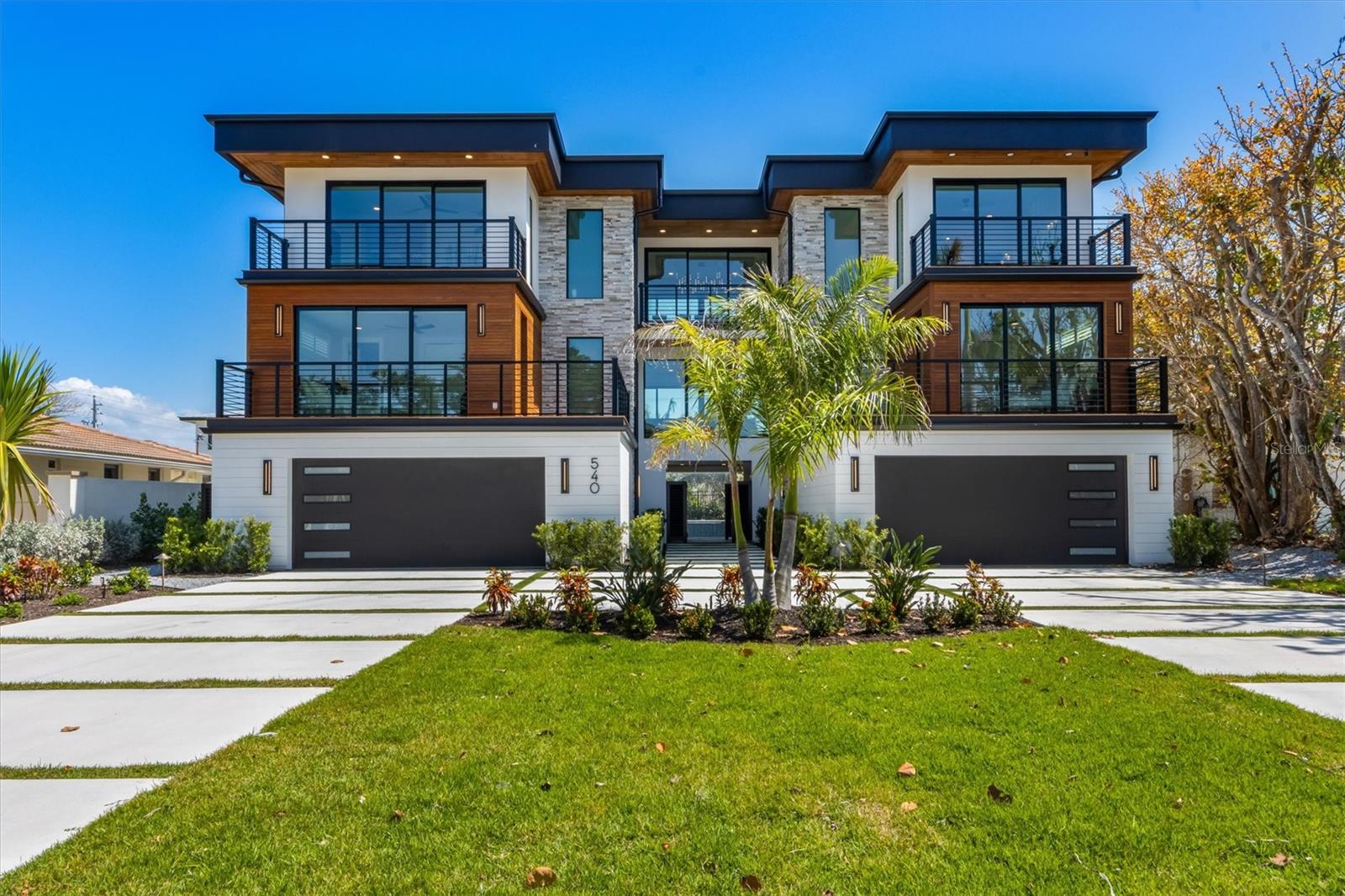 Welcome to Lido Luxe Estate, Sarasota’s Hidden Gem in Lido Key! This beautifully appointed 6-bedroom, 6.5 bathroom home offers the perfect retreat for families, groups and friends seeking a luxurious beach escape. Ideally situated just a short walk from the pristine Gulf beaches and the upscale shops and restaurants of St. Armands Circle, Lido Luxe Estate provides the ideal blend of elegance and privacy. One of the premiere island houses, Lido Luxe Estate boasts of high-end finishes in both indoor and outdoor areas. The gourmet kitchen includes a large island, coffee bar and top of the line appliances including Sub-Zero and Wolf. The large dining area offers an elegant setting for a memorable group dining experience. A built-in grill, off the kitchen in a covered balcony, completes the extraordinary culinary experience. This luxurious home includes a primary suite with a beautiful en-suite bathroom feature in a romantic backlit marble wall and a walk-in shower. There are 4 additional bedrooms with en-suite bathrooms, ensuring comfort and privacy for every guest, while the sixth bedroom features twin over queen built-in bunk beds with an en-suite bathroom ideal for the younger guests. Outdoor living is at its best at Lido Luxe Estate. The expansive backyard features a stunning heated pool and a 12-person spa with a rain curtain and customizable lighting that creates a magical evening experience. Other outdoor features include: a private putting green, ample space for such things as a pool table, ping pong, TV’s, sofas, etc., makes for an fun and relaxing atmosphere. Completing the outdoor living experience is a dining table, a bar and outdoor beverage and snack refrigerators. Sun worshipers and sunset gazers will delight in the rooftop deck providing space to take in a sunrise, sunset or just appreciate the views of the gulf and inter coastal waters, as well as the Sarasota city lights. Whether this is a second home or vacation rental the possibilities that Lido Luxe Estate offer are endless. Do not hesitate, schedule your showing today.