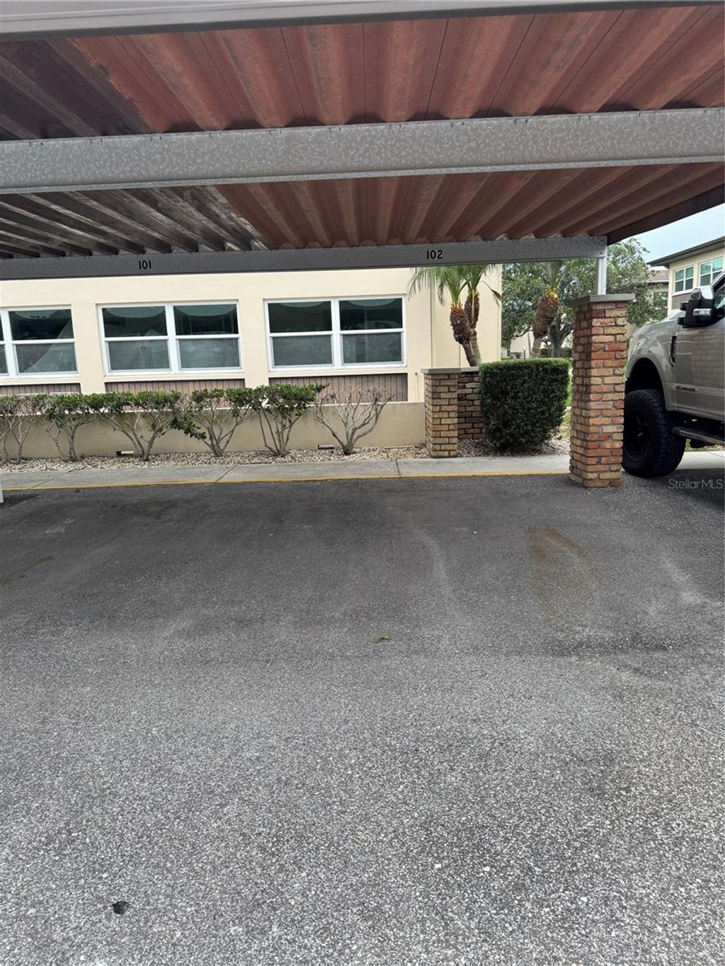 Photo of 5111 Amulet Drive #102, New Port Richey, FL 34652 (MLS # W7875854)