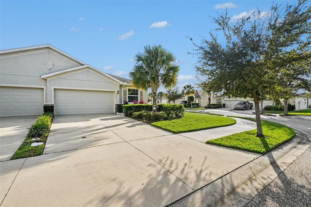 Photo of 32976 Windelstraw Drive, Wesley Chapel, FL 33545 (MLS # TB8563029)