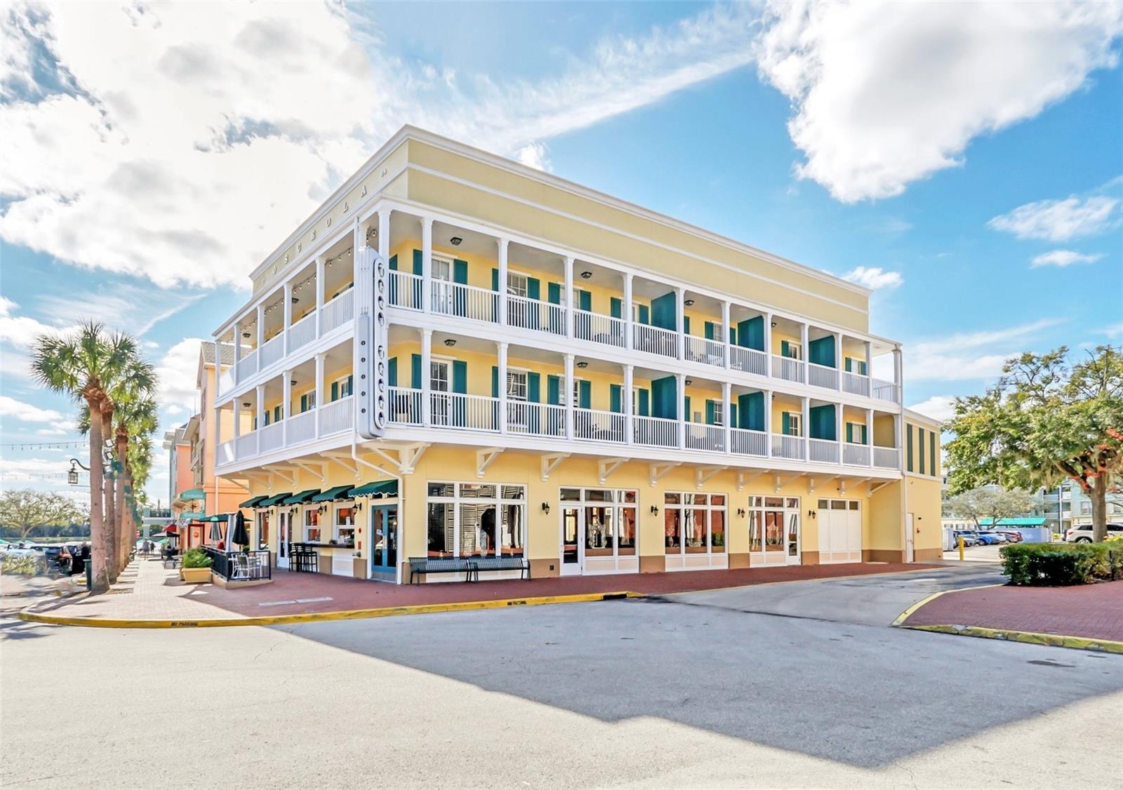 Welcome to your dream condo in the heart of Celebration, Florida! Located at 600 Market St., Unit 210, this stunning property is the epitome of elegance and convenience. Nested right above the delightful Thai Thani Restaurant, you're just steps away from the finest dining in Celebration. This desirable condo is situated in an ELEVATOR building, providing easy access directly from the elevator to your doorstep. Step inside and be enthralled by the chic, updated European design that flows throughout the space. The highlight of this residence is undoubtedly one of the largest wraparound balconies in downtown Celebration. It's the perfect spot to enjoy Town Center events, parades, or simply unwind with your morning coffee or evening wine. The open-concept design seamlessly connects the kitchen to the living area, offering a warm and inviting atmosphere for gatherings and relaxation. The kitchen features all-modern appliances, and an eat-in area, making it a functional and stylish space for culinary creations. Practicality meets luxury with the upgraded closet at the entrance, equipped with a stackable washer and dryer for utmost convenience. The primary bathroom is a showcase of European elegance with a sleek shower featuring a sliding glass door, chic cabinetry, and upgraded lighting. The second bathroom offers a tub with shower. The condo's layout includes 3 convenient exits to the balcony—one off the living area, one off of the primary and another directly from the 2nd bedroom, enhancing the indoor-outdoor living experience. With its prime location and exquisite features, this condo is a rare find and won't be on the market for long. Don’t miss out on this opportunity to own a piece of Celebration's charm and excitement. Schedule your appointment today and discover why this vibrant community is the perfect place to call home. LIVE THE CELEBRATION, FLORIDA LIFESTYLE!