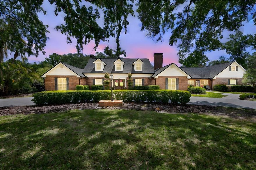 Welcome to this gem of a home in the highly sought-after equestrian community of Hickory Creek, located in Brandon. This truly one-of-a-kind property offers space, versatility, and timeless charm.From the moment you step through the front door, you are welcomed by an abundance of natural light and inviting living spaces. The formal living room features a charming wood-burning fireplace and flows seamlessly into the spacious dining room, creating the perfect setting for entertaining family and friends.The heart of the home is the chef's kitchen, complete with a gas range, a beautiful island ideal for gathering, a butler's pantry, and a dual-sided gas fireplace that connects the kitchen to the cozy family room. Just off the kitchen is an additional flexible living space that can easily serve as a home office, gym, media room, or additional lounge area perfectly suited to your lifestyle.The primary suite is conveniently located on the main floor and offers two large walk-in closets with built-ins, including laundry hookups in one closet for added convenience.The bathroom has dual vanities, a soaking tub and large walk-in shower. Upstairs, you'll find two generously sized bedrooms, each featuring its own private ensuite bathroom. A fourth bedroom is located above the private theater room and is accompanied by another full bathroom.Step outside to your private backyard oasis featuring a pool and spa combination surrounded by an expansive paved patio and a charming gazebo. With plenty of space to relax or escape the Florida sun, this outdoor retreat is ideal for entertaining or enjoying peaceful mornings and evenings overlooking the lush backyard.This property also offers incredible versatility with additional living space adjacent to the carport. This separate area includes a bedroom and living space and, with the addition of a bathroom, could easily become a private multi-generational suite. In addition, the guest house features a living area, kitchen, and laundry on the first floor, with a bedroom and bathroom upstairs,perfect for extended family or visiting guests.This remarkable property offers space, flexibility, and endless possibilities, all within the beautiful Hickory Creek community. Come experience everything this exceptional home has to offer!