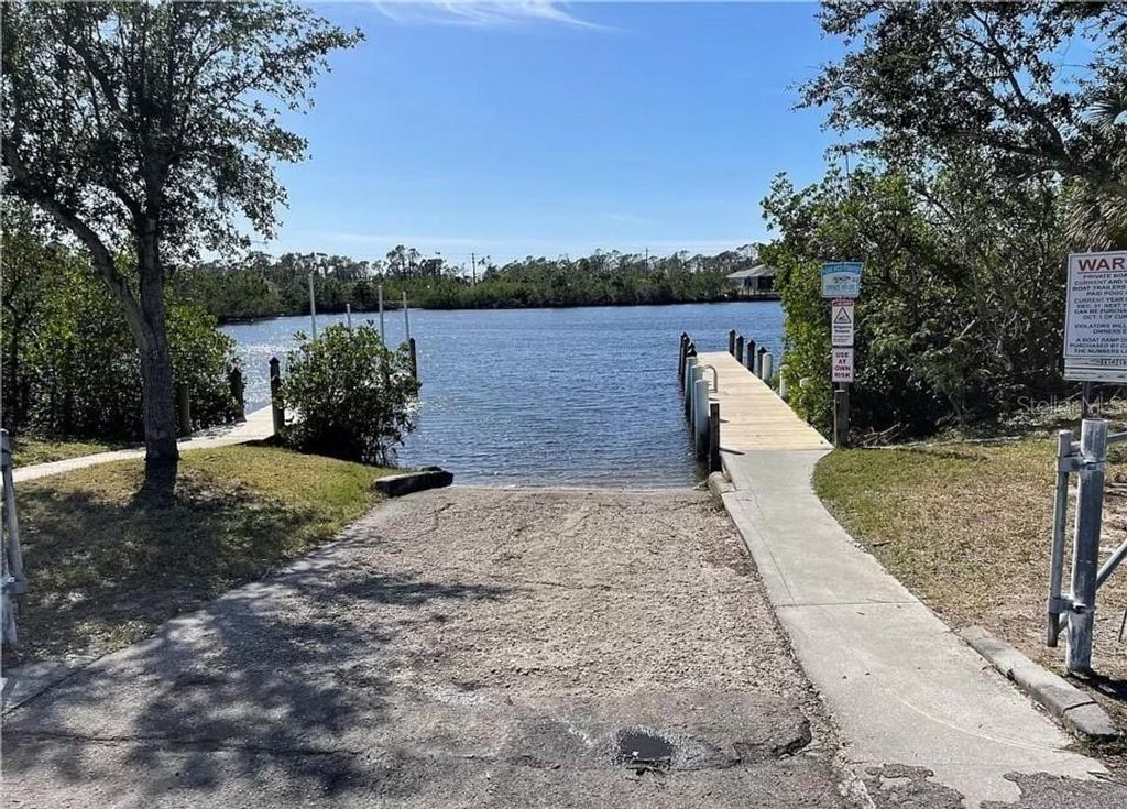 Photo of 12105 Snow Bird Avenue, Port Charlotte, FL 33981 (MLS # O6166160)