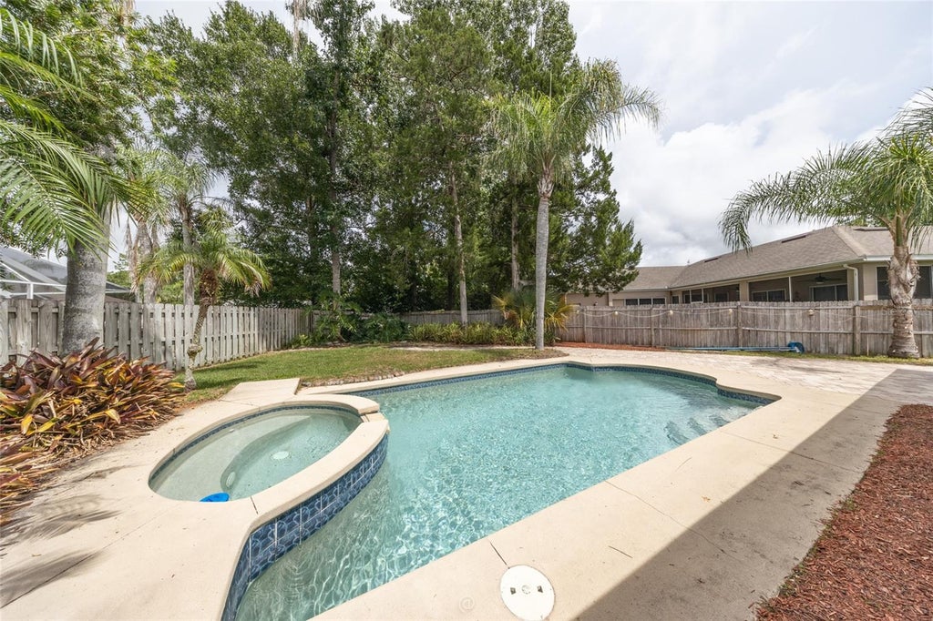 Photo of 34 Woodholme Lane, Palm Coast, FL 32164 (MLS # FC321144)