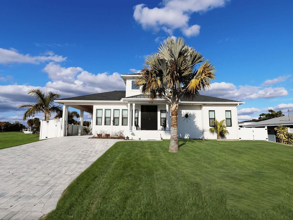 Photo of 112 Leland Street SE, Port Charlotte, FL 33952 (MLS # C7520723)