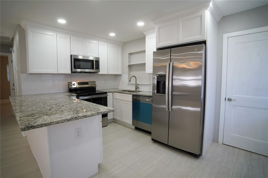 Photo of 610 74th Avenue N, St Petersburg, FL 33702 (MLS # TB8501613)