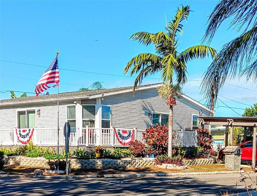 Holiday Village is a well-desired Resident Owned Community and in a Location where anything is accessible.  Come Home to your 2018 Manufactured Home (Rated for Cat 3 (150 mph), Beautifully Layered Landscaping C corner Lot and Fenced. *When you enter you will see the quality as you gaze your eyes upon the Coffered Ceilings in the Kitchen and Dining Room, which is large enough for a Pool Table. As you look further to the substantially sized Living room, Feel the openness with the 12-foot adorned ceilings with Crown Molding throughout the entire home. *The Kitchen has ample room for more than one cook at a time. Sleek Pendant lighting above the Center Island with Prep / Bar Sink and Electric. GE Profile Appliances include a 6 Burner Gas Range, Convection Oven w/ Vented Hood, Custom Solid Wood Cabinets with a plethora of Counter space, Wrap around Breakfast Bar, Display Cabinets, Extra outlets including USB for your small appliances, electronics, and Recessed Puck Lighting to brighten the area and Large Pantry. *There are so many ways to unwind in the elaborate Master Bedroom, large enough for a sitting area including an En Suite Bath. Imagine a whole home Water Softener System & On Demand Rinnai Tankless Water Heater to enjoy your spacious Standing Shower Stall, Custom Rain Shower Head w/ 4 Jets, Dual Vanity, Jetted Tub for your calming bath while you gaze into the built-in electric Fireplace. The second Bedroom has its own entry. Third bedroom can be utilized as a Den/Office with a closet and French Doors. The convenience of an inside Laundry Room with Cabinets is also a luxury to add to this Custom Manufactured Home and can be all yours if you secure it before others. FEELING MOTIVATED? You are 2 miles from our Award Winning Beaches, steps away from the 53-mile Pinellas Trail for walking or biking, Seminole Town Center, Movie Theatres, Fitness Center, Restaurants, Public Transportation, Grocery Stores, VA at Bay Pines, Golf Courses, and more. ALL AGE, NO LOT RENT, Low HOA fee of $120/monthly, includes, water, sewer, lawn maintenance, on-site management, and maintenance. 2 Pets Allowed, 40 lb. weight limit, Association Application required, background check (NO Felonies, MUST HAVE minimum 650 credit score) required, ($100 application fee for individual, $150 per couple) No RENT, LEASE OR SUB LEASE ALLOWED. “As Is” FOR CONVENIENCE TO Seller’s.