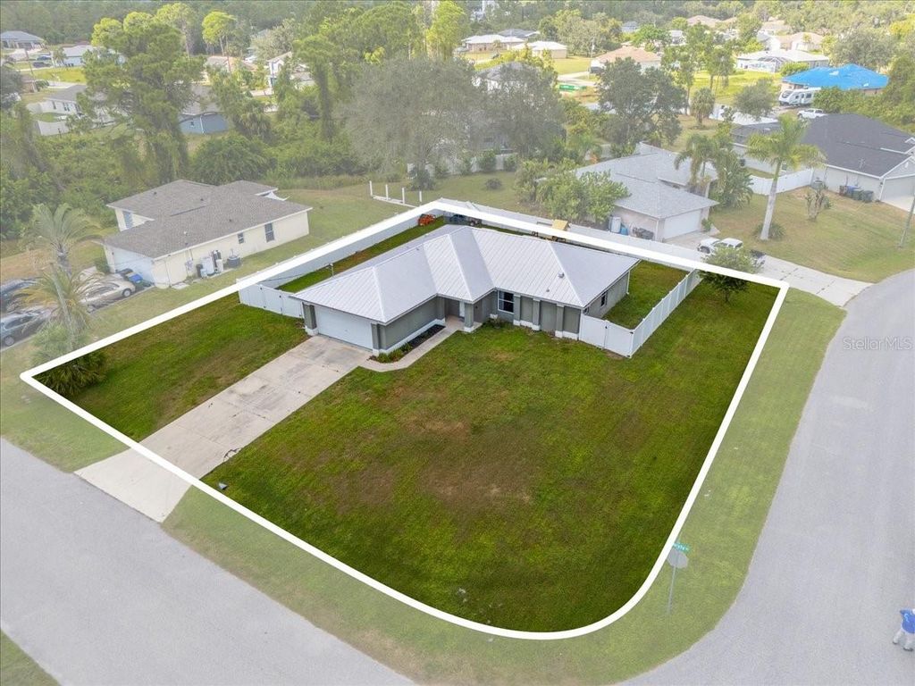 Photo of 2497 Amnesty Drive, North Port, FL 34288 (MLS # C7516587)