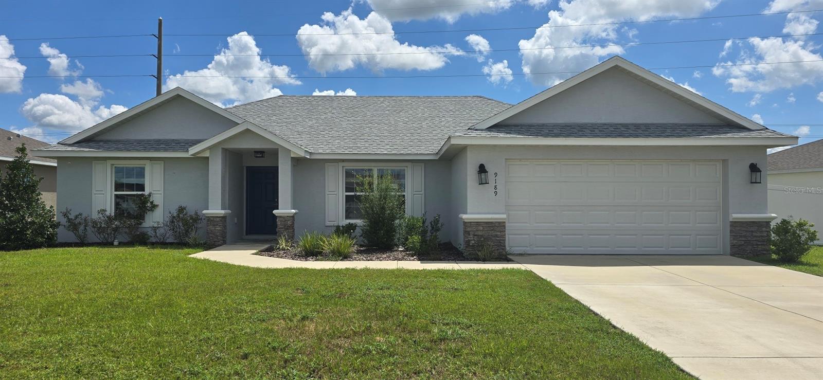 Newer 3 bed, 2 bath home in the Oaks at Ocala Crossing. Split floor plan with a 2-car garage. Covered patio in back of home, with partially fenced backyard. Granite countertops in kitchen and bathrooms. Inside laundry room. Near SR 200 and I-75 interchange.