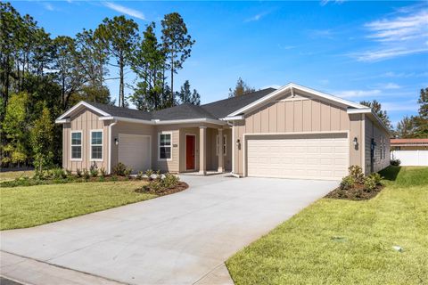 Photo of 14037 NW Convergence Boulevard, Alachua, FL 32615 (MLS # O6397473)