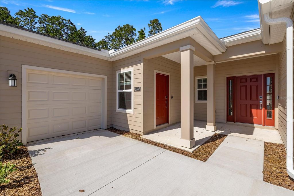 Photo of 14037 NW Convergence Boulevard, Alachua, FL 32615 (MLS # O6397473)