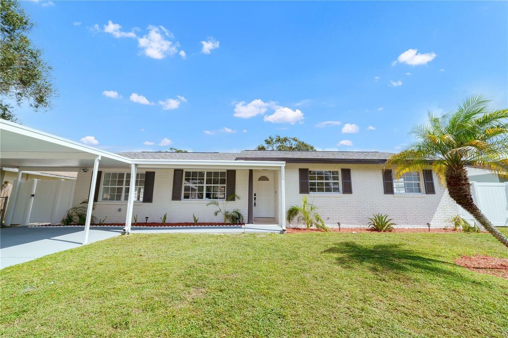 Photo of 5805 Hammon Drive, Tampa, FL 33619 (MLS # TB8436333)